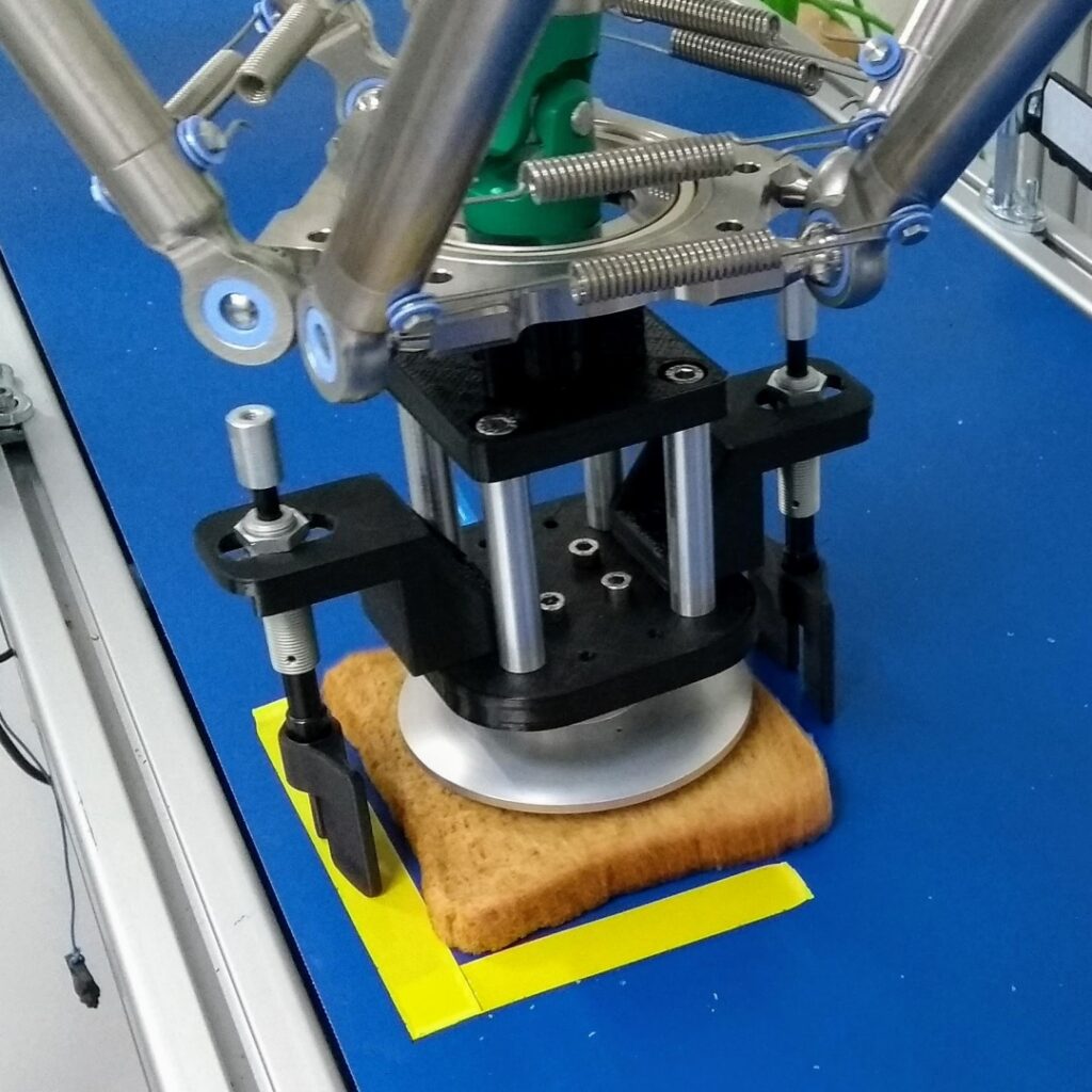 Bernoulli Gripper for Sandwich Lidding